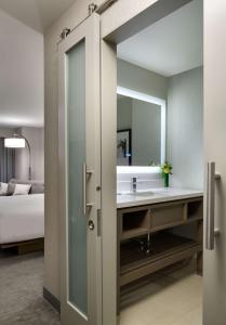 a bathroom with a sink and a mirror at Hyatt Regency Boston in Boston