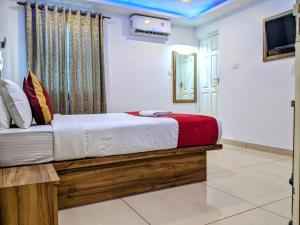 Ένα ή περισσότερα κρεβάτια σε δωμάτιο στο Hotel Feathers