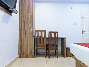 TV a/nebo společenská místnost v ubytování Hotel Feathers + 31 fotografií