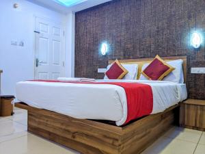 Ένα ή περισσότερα κρεβάτια σε δωμάτιο στο Hotel Feathers