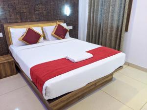 Ένα ή περισσότερα κρεβάτια σε δωμάτιο στο Hotel Feathers