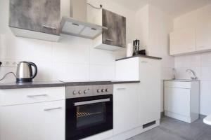 Air Apartments 12 tesisinde mutfak veya mini mutfak