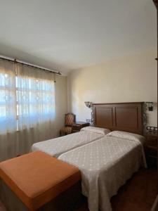 Postel nebo postele na pokoji v ubytování Casa rural osvilares
