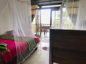 Postel nebo postele na pokoji v ubytování Felicity Inn
