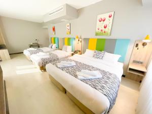 Ένα ή περισσότερα κρεβάτια σε δωμάτιο στο Center Inn Hotel Maltepe İstanbul +27 φωτογραφίες
