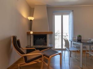A seating area at Mamma Ciccia Holiday Home - Sunset Balcony