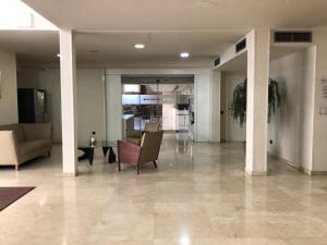 TV a/nebo společenská místnost v ubytování BCN Urbaness Hotels Del Comte