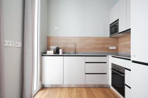 Kuchyňa alebo kuchynka v ubytovaní Numa Seville Prestigio