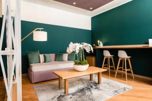 a living room with a couch and a table at Villa Rufo in Caserta