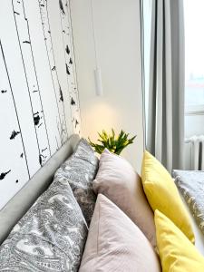 Giường trong phòng chung tại Apartament BIANCO CLASSIC w centrum miasta.