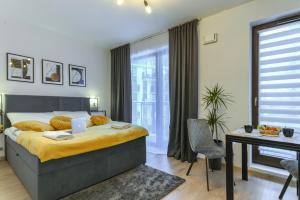 Posteľ alebo postele v izbe v ubytovaní Wola Luxury Stay
