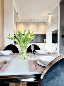 Η κουζίνα ή μικρή κουζίνα στο Apartament BIANCO CLASSIC w centrum miasta.