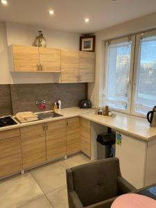 Virtuvė arba virtuvėlė apgyvendinimo įstaigoje Prestige Apartament