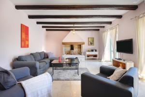 Ein Sitzbereich in der Unterkunft Villa Lucia