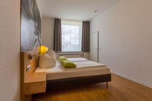 Letto o letti in una camera di 3 Raum Ferienwohnung Premium