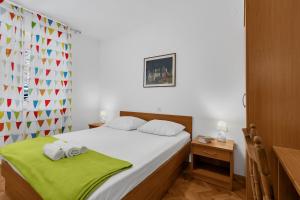 Postel nebo postele na pokoji v ubytování Apartment Marica