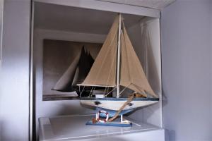 a model of a boat in a display case at Abbey View Bagdale in the Centre of Whitby in Whitby