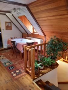 a dining room with a table in a house at Pension Meandr in Český Krumlov