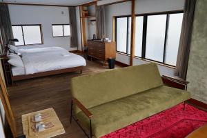 Kama o mga kama sa kuwarto sa Tagore Harbor Hostel