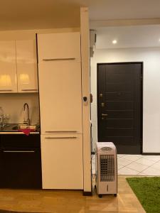 Kuchyňa alebo kuchynka v ubytovaní Localita Polin 15, apartamenti 21