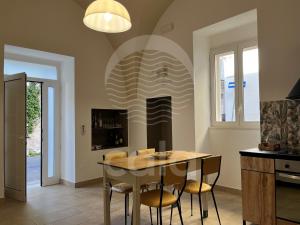 Et tv og/eller underholdning på Le Volte - Santa Maria al Bagno By Cala Salento