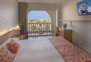Posteľ alebo postele v izbe v ubytovaní Gran Hotel del Coto