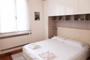 A bed or beds in a room at I Cigni