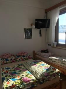 Posteľ alebo postele v izbe v ubytovaní Villa jumper widok na całe Tatry łazienka nie jest w pokoju i jest wspólna z innymi ludźmi