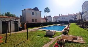 a yard with a swimming pool in a house at Casa Sol & Mar, Rincon de la Victoria, Malaga in Rincón de la Victoria