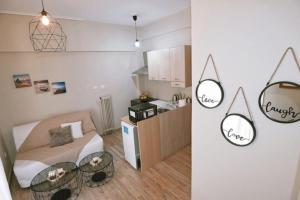 A kitchen or kitchenette at Cozy Apartment in the heart of Athens!
