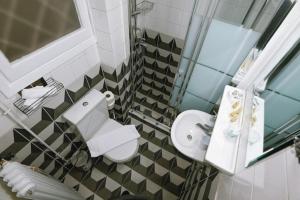 A bathroom at Cozy Apartment in the heart of Athens!