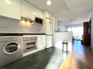 Kuchyňa alebo kuchynka v ubytovaní Golden Sand Apartment Cambrils