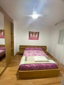 Cama o camas de una habitación en Apartamento moderno con piscina en Almería capital
