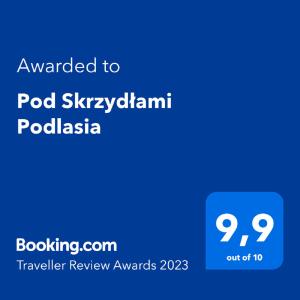 Ett certifikat, pris eller annat dokument som visas upp på Pod Skrzydłami Podlasia