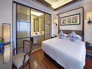 Postel nebo postele na pokoji v ubytování SSAW Boutique Hotel Shanghai Hongkou