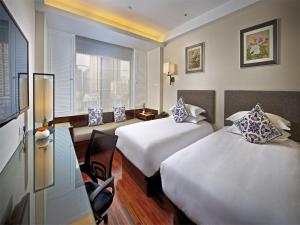 TV a/nebo společenská místnost v ubytování SSAW Boutique Hotel Shanghai Hongkou