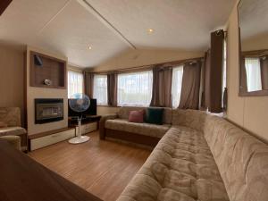 Гостиная зона в Ferienhaus / Ferienwohnung am Badesee nähe Leipzig mit Privatsstrand und Sauna