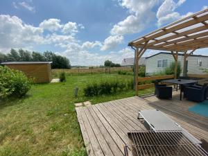 Сад в Ferienhaus / Ferienwohnung am Badesee nähe Leipzig mit Privatsstrand und Sauna