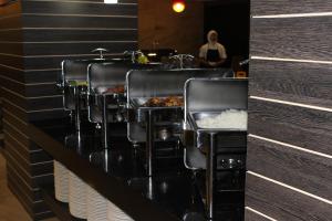 Restoran atau tempat lain untuk makan di Symphony Suites Hotel