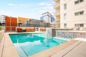 a swimming pool in the middle of a building at LoDo 1BR w WD Pool Gym nr Union Station DEN-152 in Denver