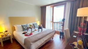Postel nebo postele na pokoji v ubytování Savoia Resort