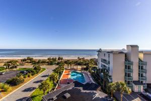 an aerial view of a hotel and the beach at Oceanfront 1 bedroom King suite- Ocean Forest Plaza 1911 in Myrtle Beach