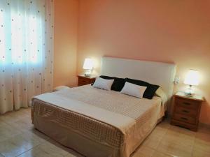 Posteľ alebo postele v izbe v ubytovaní Villa Lluna