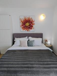 Posteľ alebo postele v izbe v ubytovaní King's Apartment