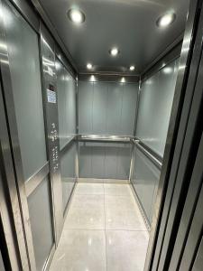 a walk in closet with glass walls and a ceiling at Centro1555 in Buenos Aires