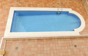 The swimming pool at or close to 3 Bedroom Gorgeous Apartment In El Grau De Moncofa