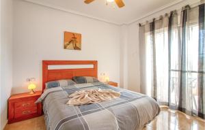 Postel nebo postele na pokoji v ubytování 4 Bedroom Lovely Home In Ciudad Quesada + 12 fotografií