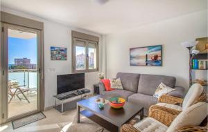 TV a/nebo společenská místnost v ubytování Cozy Apartment In El Campello With Wifi