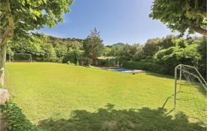 a large grassy field with a soccer goal at Stunning Home In Vilanova Del Valls With Outdoor Swimming Pool in Vallromanes