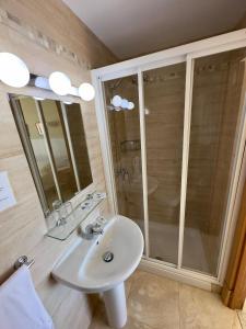 Koupelna v ubytování Hotel Cabello